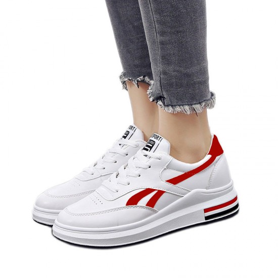white sneakers red stripe