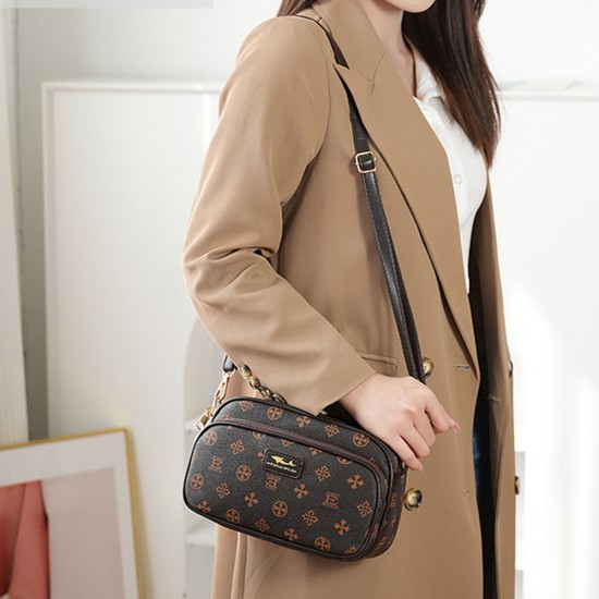 Brown round hotsell crossbody bag