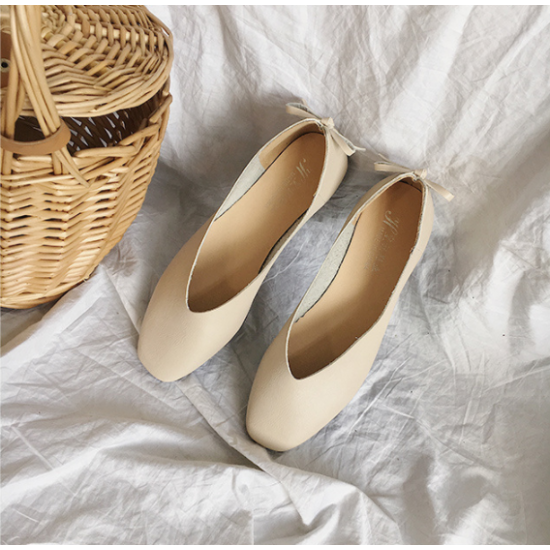 cream colored flat shoes